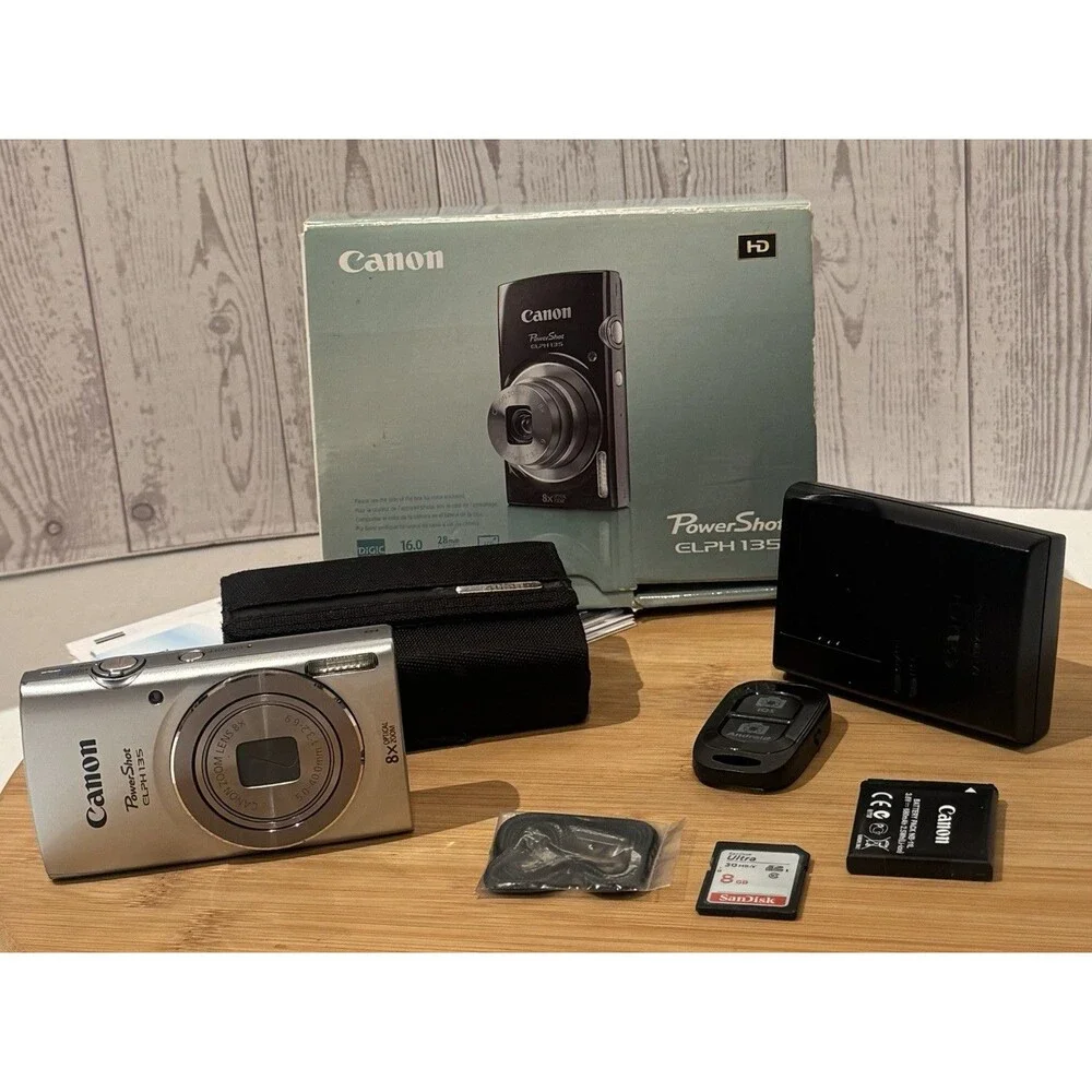 Canon PowerShot ELPH 135 16MP Digital Camera Silver Battery, Charger Etc. Clean